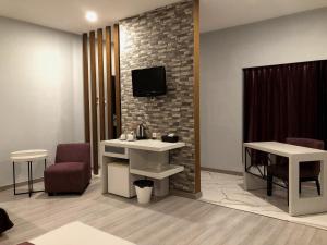 TV o dispositivi per l'intrattenimento presso Hotel Sinar 1