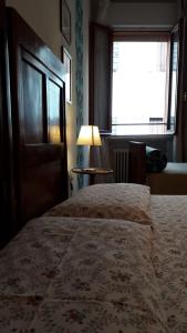 Postel nebo postele na pokoji v ubytování B&B Barberia