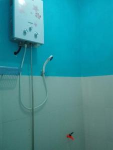 Ванная комната в Homestay Andari