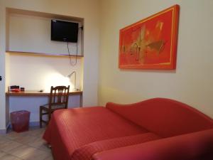 TV a/nebo společenská místnost v ubytování B&B Domus Traiani Benevento
