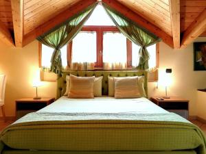 Postel nebo postele na pokoji v ubytování B&B Domus Traiani Benevento