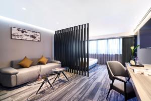 Ein Sitzbereich in der Unterkunft Hotel COZi Oasis
