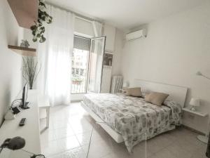 Posteľ alebo postele v izbe v ubytovaní Residenza Riva Reno - BOLOGNA