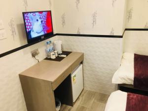 Televisyen dan/atau pusat hiburan di Vve Vve Hotel +29 gambar