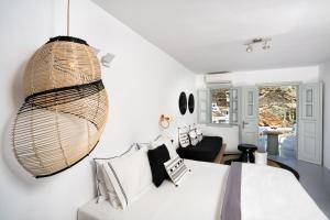 Cama ou camas em um quarto em Blue Sand Boutique Hotel & Suites