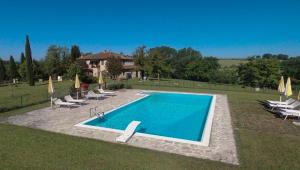 The swimming pool at or close to La Casa del Contadino