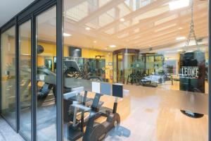 a gym with a table and some exercise equipment at Residenza Porta Volta in Milan