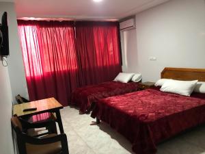Postel nebo postele na pokoji v ubytování Raiss Hotel + 19 fotografií