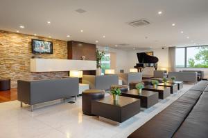 TV a/nebo společenská místnost v ubytování Hotel dos Zimbros