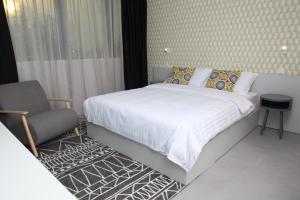Postel nebo postele na pokoji v ubytování Hotel Cubis