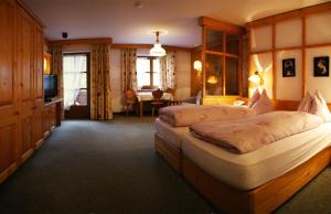 En eller flere senger på et rom på Hotel-Gasthof "Zur Mühle"