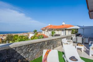 Gallery image of LUXURY WHITE VILLA with sea view, heated pool in Adeje