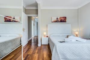 Posteľ alebo postele v izbe v ubytovaní LUXURY WHITE VILLA with sea view, heated pool