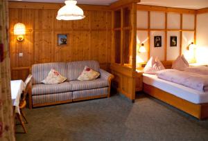 En eller flere senger på et rom på Hotel-Gasthof "Zur Mühle"