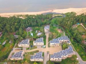 an aerial view of a resort complex near the water at Saules Club Apart Hotel in Saulkrasti