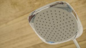 a clear strainer sitting on top of a shower at Lost and Found in Koh Rong Sanloem