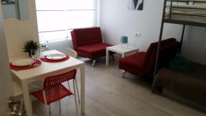 Posedenie v ubytovaní Apartamento Moriones A. A150 m del mar en centro de ciudad