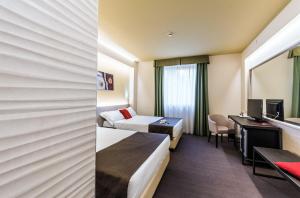 Postel nebo postele na pokoji v ubytování Antony Hotel - Venice Airport