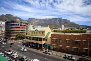 a view of a city with a mountain in the background at Trendy Cape Town CBD Apartment in Cape Town