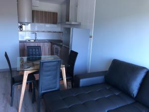 Kuchyň nebo kuchyňský kout v ubytování Apartamentos Augusto