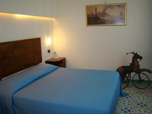 Postel nebo postele na pokoji v ubytování Sorrento Inn Guesthouse