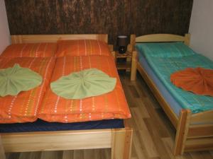 Uma cama ou camas num quarto em Ubytovanie Bičár