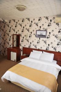 Postel nebo postele na pokoji v ubytování Saray Hotel