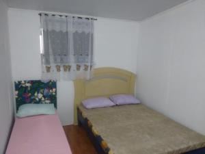 Cama o camas de una habitación en Apartamento Da Praça