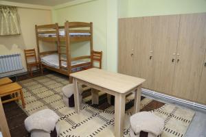 Ένα ή περισσότερα κρεβάτια σε δωμάτιο στο Arsego Hostel