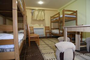 Ένα ή περισσότερα κρεβάτια σε δωμάτιο στο Arsego Hostel