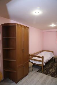 Ένα ή περισσότερα κρεβάτια σε δωμάτιο στο Arsego Hostel