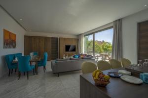 a living room with a couch and a table at Marrakech Holiday in Marrakesh