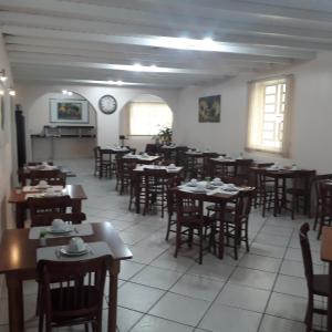 A restaurant or other place to eat at Cithos Hotel