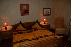 Postel nebo postele na pokoji v ubytování Wieting´s Hotel