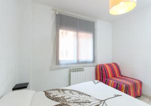 Posteľ alebo postele v izbe v ubytovaní Apartment Rambla Tarragona Free parking