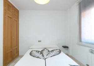 Posteľ alebo postele v izbe v ubytovaní Apartment Rambla Tarragona Free parking