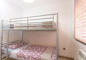 Posteľ alebo postele v izbe v ubytovaní Apartment Rambla Tarragona Free parking