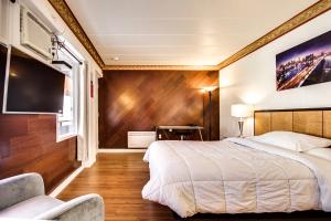 Postel nebo postele na pokoji v ubytování Motel Bellefeuille