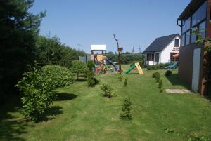 Ogród w obiekcie Agrodomki Okej -Dom Koko