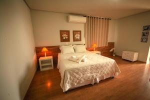 En eller flere senge i et værelse på Pousada Parador da Figueira + 63 billeder