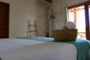 Postel nebo postele na pokoji v ubytování Tierra Mia Boutique Hotel