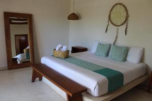 Postel nebo postele na pokoji v ubytování Tierra Mia Boutique Hotel