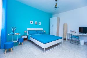 Postel nebo postele na pokoji v ubytování Quelli della via Gluck