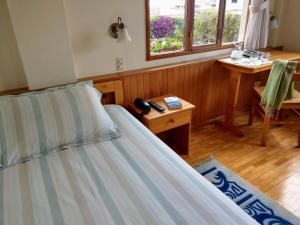 Postel nebo postele na pokoji v ubytování Hotel Rincon Aleman