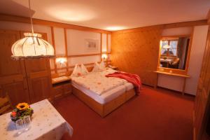 En eller flere senger på et rom på Hotel-Gasthof "Zur Mühle"