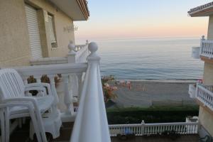 a balcony of a house with a view of the ocean at Balcon del mar in El Morche