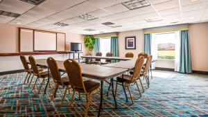 a conference room with a table and chairs at Quality Inn & Suites in Burkburnett