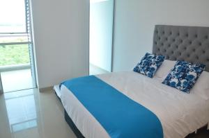 Krevet ili kreveti u jedinici u okviru objekta Apartamentos en Morros Cartagena