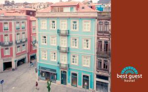 
a street scene with a building and buildings at Best Guest Porto Hostel in Porto
