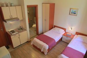 Posteľ alebo postele v izbe v ubytovaní Villa Spalatina
